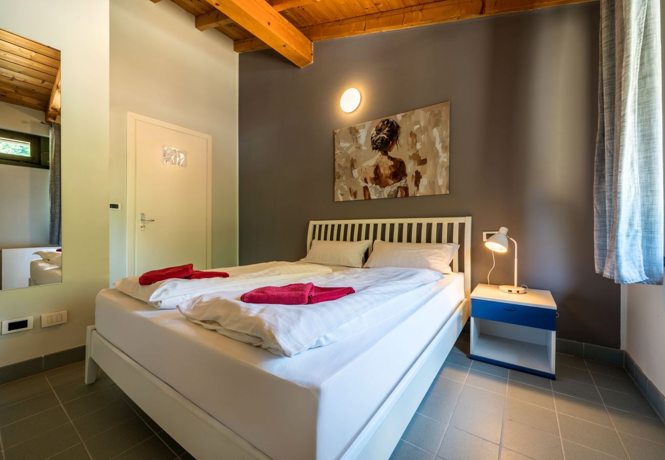 Zimmeranmietung in Idro - Gästezimmer - Queensize Bett Zimmeranmietung in Idro - Gästezimmer - Queensize Bett